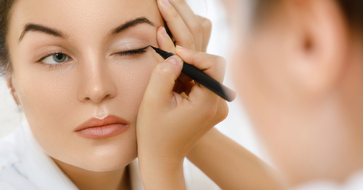 Women applying eyeliner on eyes in Missoula, MT