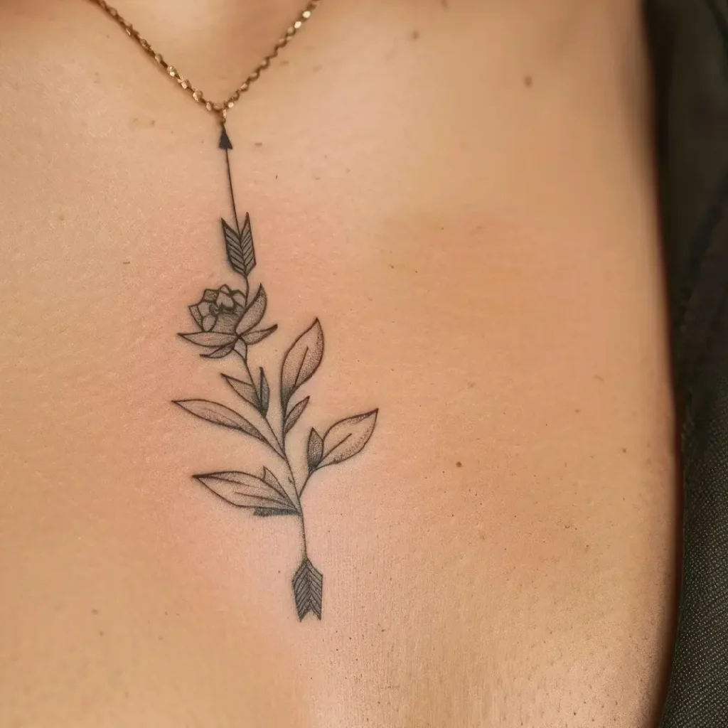 A delicate, permanent jewelry piece on a woman's neck.